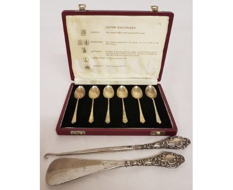 A cased set of 6 silver coffee spoons together with silver handled boot hook &amp; shoe horn. Spoons hallmarked Sheffield 196