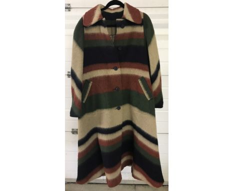 A ladies vintage 1970's flared style winter coat. With front pockets, green, brown, black and beige colours. 