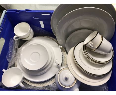 A quantity of mostly white ceramic dinner and tea ware. To include Royal Doulton "Oxford Black" cups and saucers, Royal Doult