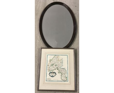 A vintage oval dark oak frame hanging mirror with bevel edge glass. Together with a framed and glazed print of Oxfordshire ma