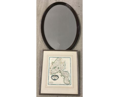 A vintage oval dark oak frame hanging mirror with bevel edge glass. Together with a framed and glazed print of Oxfordshire ma