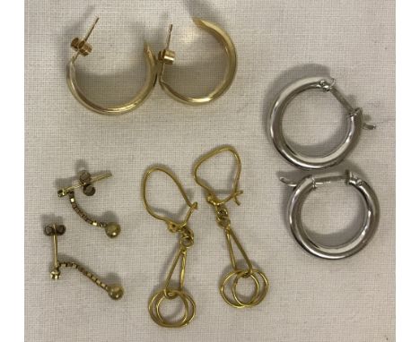 4 x pairs of 9ct gold earrings. Comprising: White gold hoops marked 9k Italy. Yellow gold hoops on posts, not marked but test
