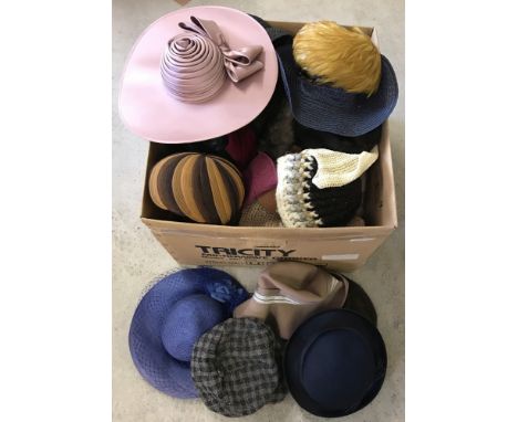 A large quantity of assorted vintage and modern ladies hats. To include First Avenue, Genevieve Louis and Yessica. 