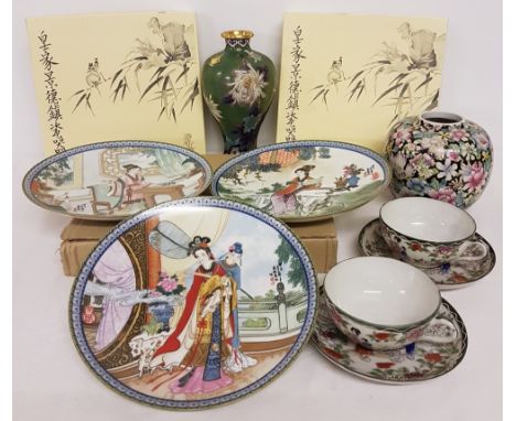 A collection of Chinese items comprising: 3 boxed ceramic plates, a pair of cups &amp; saucers, a hand painted bulbous vase a