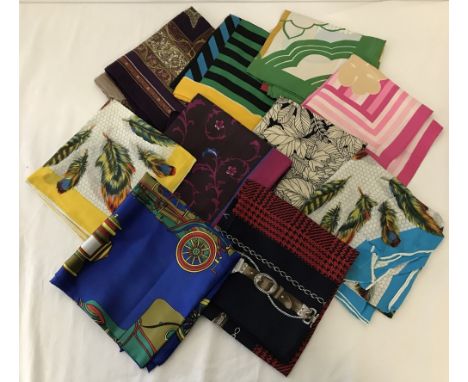10 vintage ladies square scarves. To include vintage car design, floral designs and feathers. 