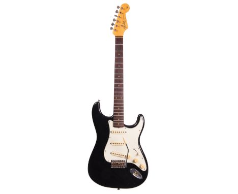1963 Fender Stratocaster electric guitar, made in USA, ser. no. L0xxx3; Finish: black, refinish, minor checking and imperfect