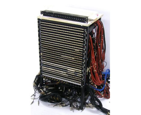 Rack unit containing a quantity of patch bays, fitted with a large quantity of specialist pro audio cables