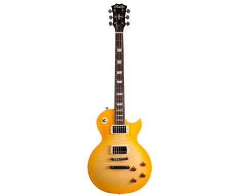 Rally Les Paul style electric guitar, gig bag; together with a Tanglewood Electric Elf Mini Les Paul style electric guitar, c