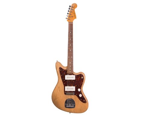 Mid 1980s Fender Jazzmaster electric guitar, made in Japan, ser. no. E5xxxx1; Finish: body stripped back to natural; Fretboar