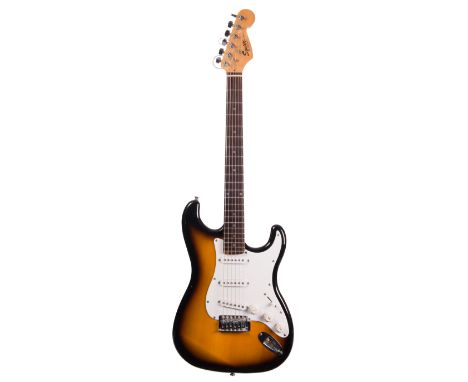 Squier by Fender Strat electric guitar; together with a Stagg bass guitar (2)