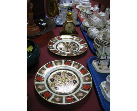 Two Royal Crown Derby 1128 Old Imari Pattern Plates, 22cms diameter and occasional faced mantel clock. (3) 