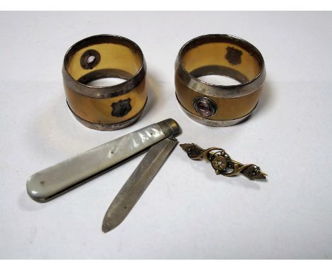 Pair of Scottish Mounted Horn Napkin Rings, featuring faceted amethyst stones, silver pen knife having mother of pearl scales