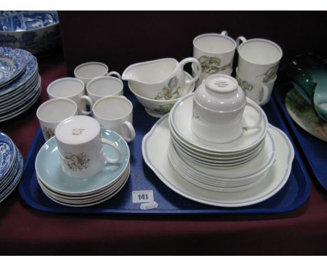 A Susie Cooper Six Setting Harlequin Coffee Service, and a Susie Cooper for Wedgwood tea service with transfer printed decora