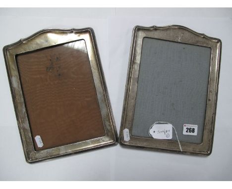 A Matched Pair of Hallmarked Silver Mounted Photograph Frames, each on wooden easel back (one easel missing). (2)