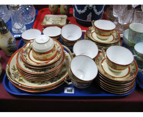 Noritake Early to Mid XX Century Tea Service, of thirty six pieces with gilt and floral overlay on cream and orange bands. 