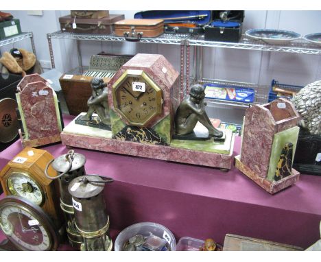 Art Deco Alabaster and Marble Three Piece Clock Garniture Set, the eight day clock having octagonal face flanked by spelter s