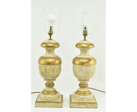 Porta Romana - A pair of gold &amp; cream aged effect wooden desk table lamps in the shape of urns. Each lamp having a turned