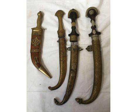  Sale Item:    4 INDIAN DAGGERS (AF)   Vat Status:   No Vat   Buyers Premium:  This lot is subject to a Buyers Premium of 15%