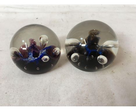  Sale Item:    2 CAITHNESS GLASS PAPERWEIGHTS   Vat Status:   No Vat   Buyers Premium:  This lot is subject to a Buyers Premi