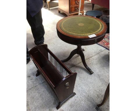  Sale Item:    ROUND TABLE &amp; PAPER RACK   Vat Status:   No Vat   Buyers Premium:  This lot is subject to a Buyers Premium