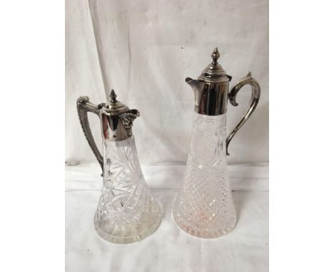  Sale Item:    2 CLARET JUGS   Vat Status:   No Vat   Buyers Premium:  This lot is subject to a Buyers Premium of 15% + Vat @