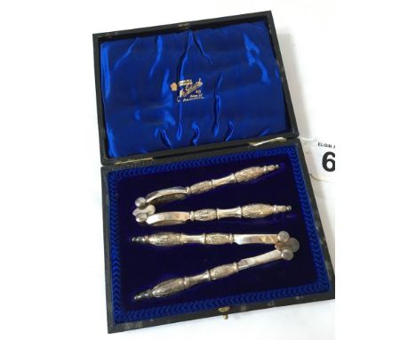  Sale Item:    CASED SILVER PLATED NUTCRACKERS   Vat Status:   No Vat   Buyers Premium:  This lot is subject to a Buyers Prem