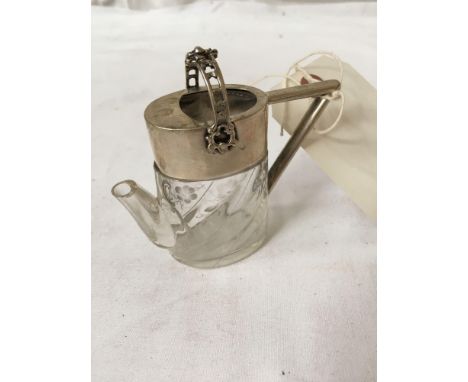  Sale Item:  SILVER MOUNTED GLASS WATERING CAN AF Vat Status:  No Vat  Buyers Premium:  This lot is subject to a Buyers Premi