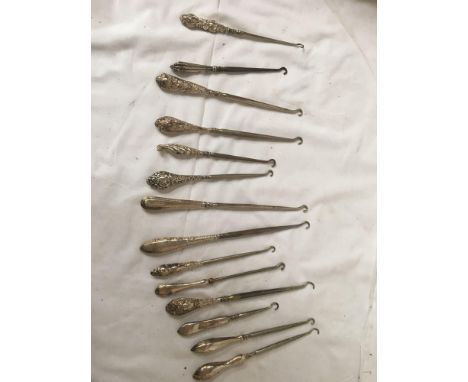  Sale Item:    14 SILVER BUTTON HOOKS   Vat Status:   No Vat   Buyers Premium:  This lot is subject to a Buyers Premium of 15
