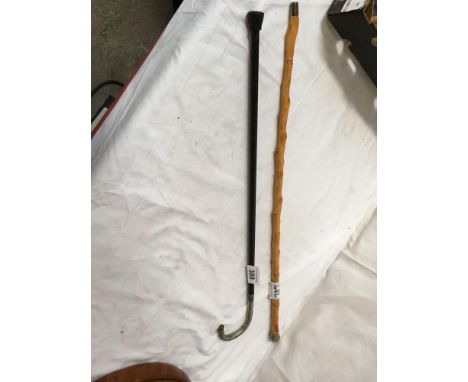 Sale Item:    2 WALKING STICKS   Vat Status:   No Vat   Buyers Premium:  This lot is subject to a Buyers Premium of 15% + Va