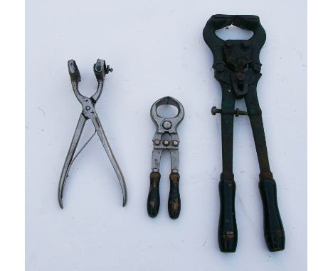 Castrating tools and an ear marking tool.3