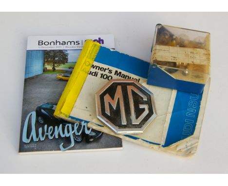 Auto collectbles including MG badge, Avenger badge, light bulbs thought to be from a mini a Bonhams Xae xatalogue and a 1973 