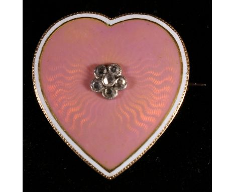 Unhallmarked gold brooch, of heart from with pink enamelled ground set to the centre with six small diamonds, arranged in flo