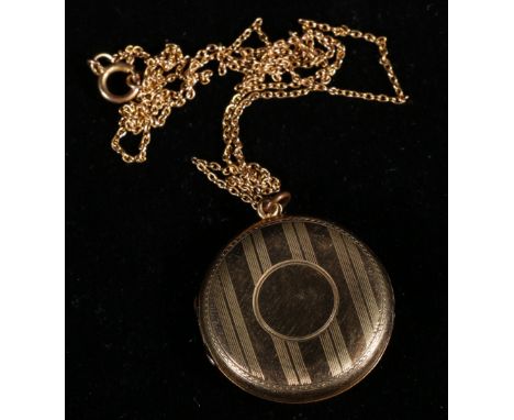 Yellow metal pendant necklace, the locket with engine turned cover, on a small curb link chain, 6g, 27cm.