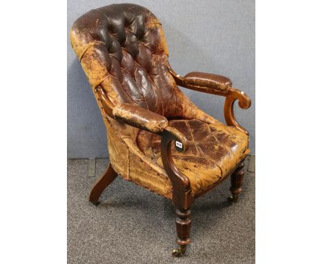 Victorian walnut framed leather button back chair, 105cm.