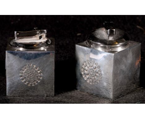 Pair of silver table lighters, with stylised flowers, maker K T, Sheffield 1971.