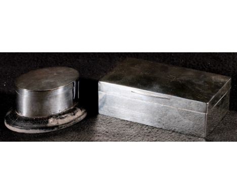 Oval silver snuff box on wooden stand and a rectangular silver cigarette box, 14cm (2) CONDITION REPORT: Snuff box - base is 