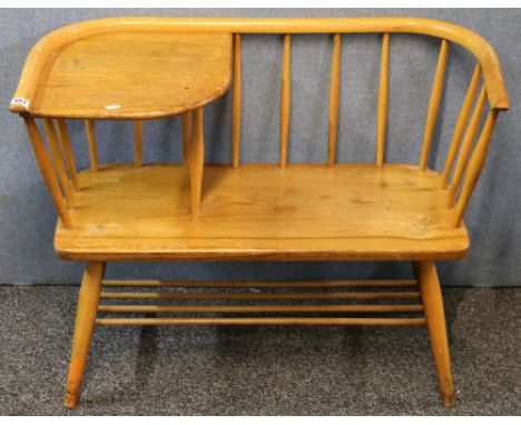 Vintage Chippy Heath elm telephone table in the Ercol style, 87cm wide.