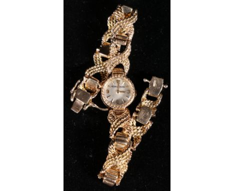 Vintage 9 carat gold Jaeger LeCoultre ladies watch, the dial with Arabic quarters and baton numerals on silvered dial, on a r