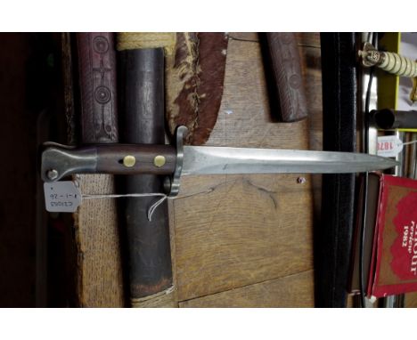 A Victorian British Pattern 1888 Mk1 knife bayonet and steel mounted leather scabbard, dated 12/96, having 30cm blade. 