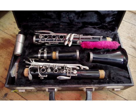 A Boosey and Hawkes 78 clarinet, no.1103444, boxed. 