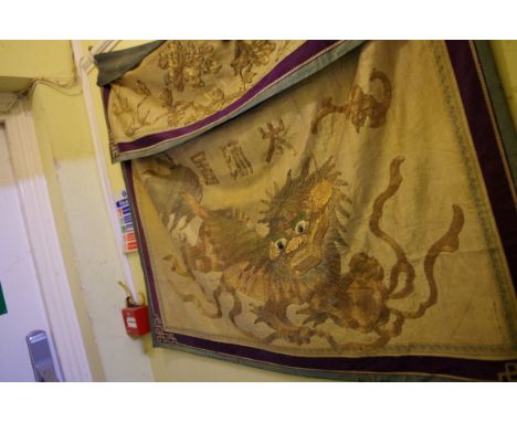 A Chinese embroidered silk panel of a lion dog,&nbsp;84 x 103cm. 