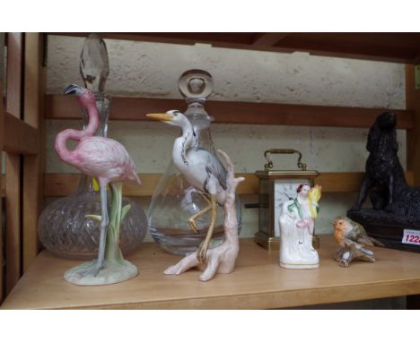 A mixed lot, comprising, a Goebel flamingo, 20cm high; a similar grey heron, 17.5cm high; two clear glass decanters and stopp