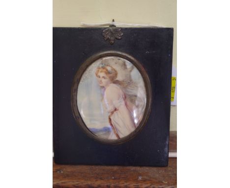 English School,&nbsp;a half length portrait miniature of a red haired lady, 8 x 6.6cm, oval. 