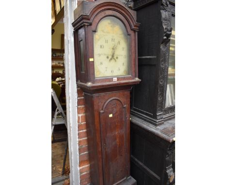 An early 19th century oak eight day longcase clock,&nbsp;the painted arched dial inscribed 'Jas Douglas, Chertsey', 216cm hig