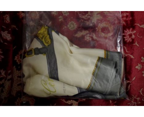 A vintage Hermes 'Harnais de Ceremonie' pattern silk scarf,&nbsp;yellow and grey colourway. 