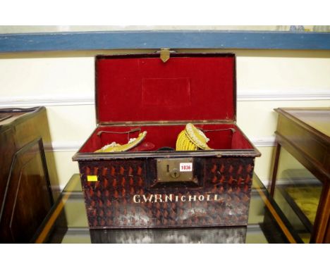 A Victorian Naval Officer's bicorn hat and epaulettes, in original tin box inscribed 'G W R Nicholl R.N.'. 