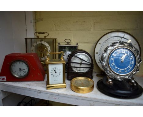 Eight various vintage timepieces, to include a Mappin &amp; Webb brass carriage example; a brown Bakelite example; and an ele