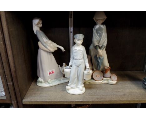 Three Lladro figures. 