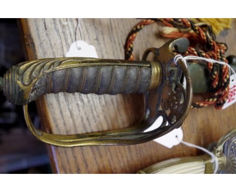 A Victorian 1822/45 pattern officers sword and scabbard; together with an Indian sword and scabbard. 