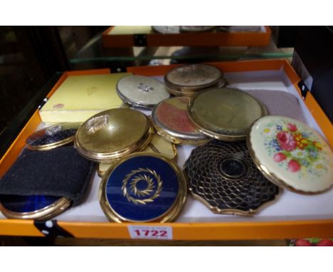 A collection of fourteen vintage compacts. 